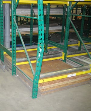 Damaged pallet rack upright