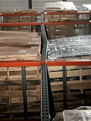 Extensive rack damage high up on the pallet rack