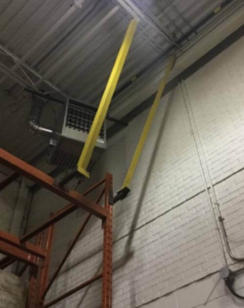 Warehouse palllet rack connected to building.