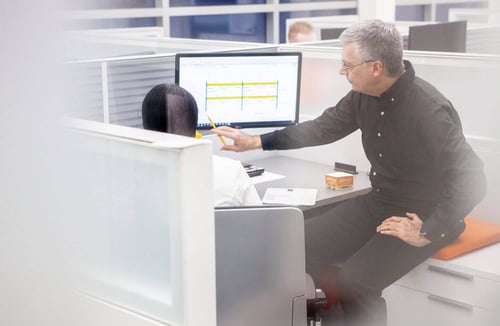 Damotech engineers evaluating data from a PSR Report