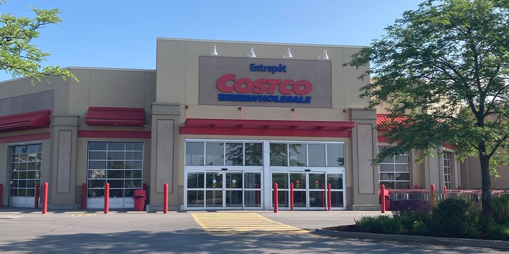 Exterior view of a Costco Wholesale building—representing Costco’s efficient warehouse-first retail strategy.