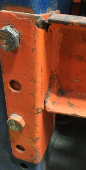 Cracked Connectors on pallet rack after earthquake