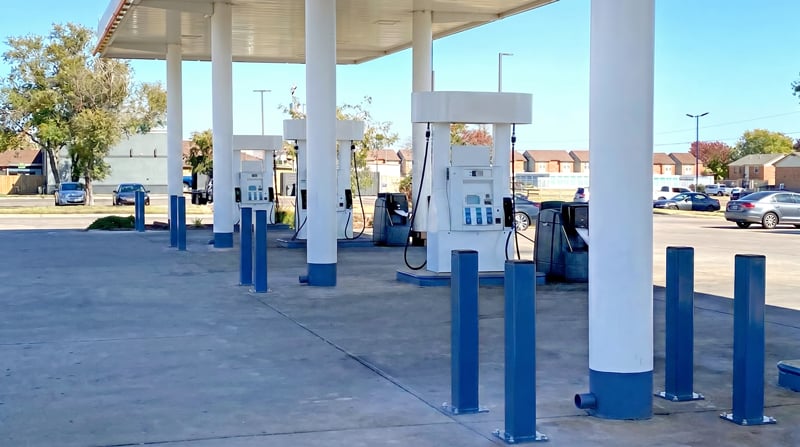 Safety bollards protecting gas station