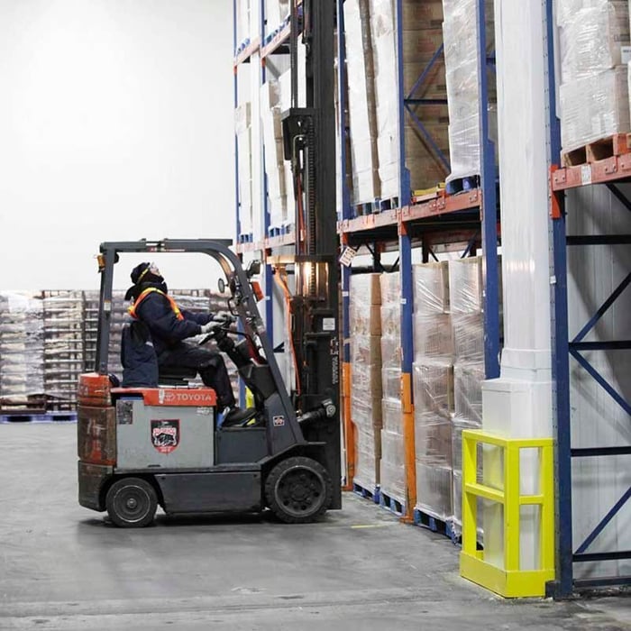 Damo Fence and Damo Guard installed at the base of warehouse pallet racking and warehouse column to prevent forklift impact and improve structural safety.
