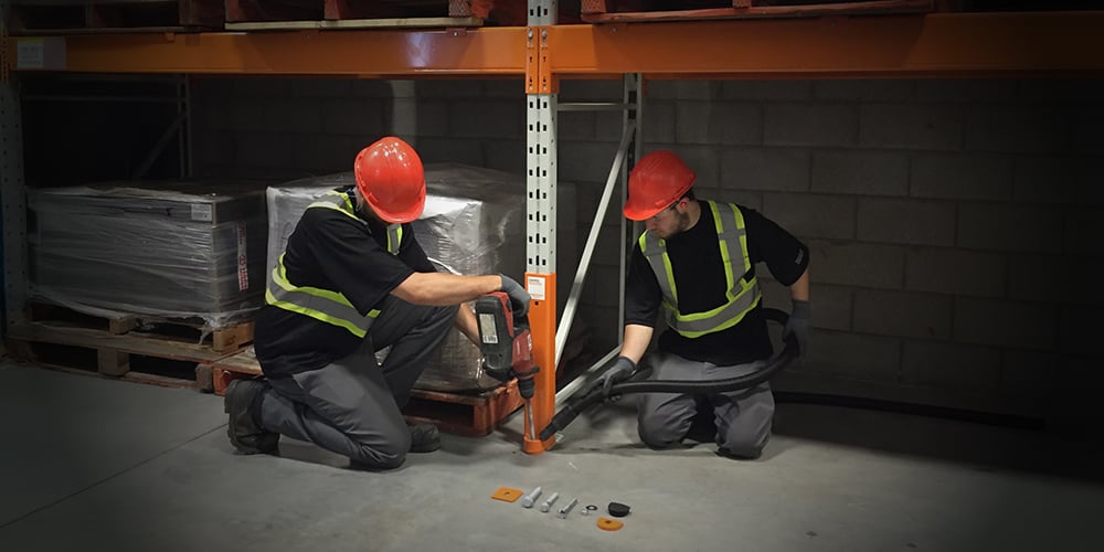 Warehouse racking crew working on a pallet rack installation