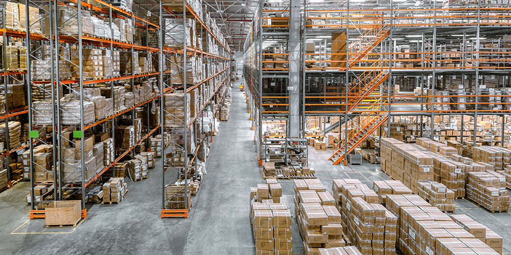 Pallet rack frames in a warehouse environment
