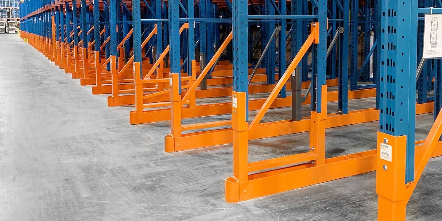 Custom DAMO PRO pallet rack repair kit down a warehouse aisle