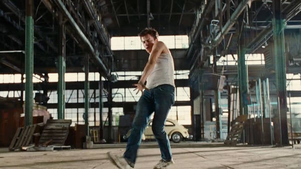 Footloose dance in an empty warehouse