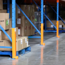 Protective column guards installed onto a racking system