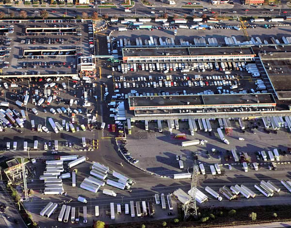 Ontario Food Terminal aerial view showing large U-shaped produce distribution building with adjacent truck bays in Toronto.