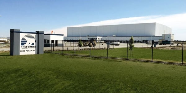 Exterior view of the 2800 Polar Way cold storage facility in Richland, Washington, with industrial freezer infrastructure and truck access bays.