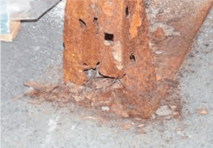 rust on pallet rack upright