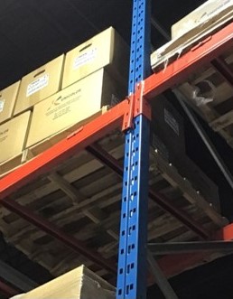 Safety pin preventing beam from fully dislodging