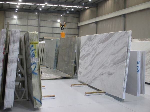 Unsafe A-frame slab storage system involved in fatal warehouse accident