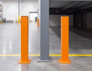 DAMO BOLLARD steel bollard protecting a warehouse mezzanine column from vehicle impact