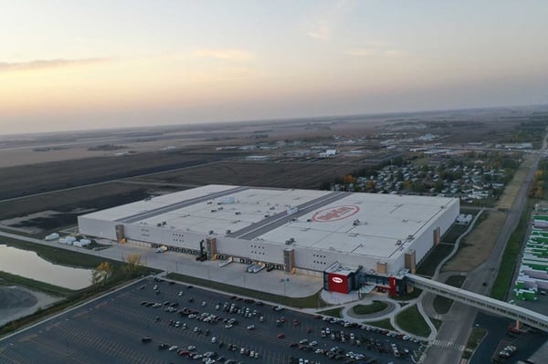 Aerial view of Walmart’s Ridgeville Import Distribution Center in South Carolina, showing the massive 3 million sq. ft. warehouse complex with loading docks, truck bays, and surrounding infrastructure.