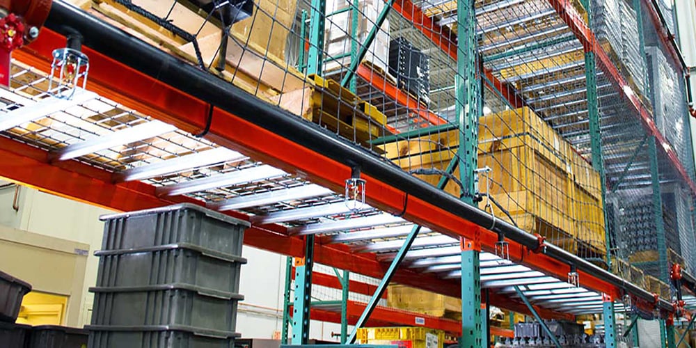 Warehouse racking with fire sprinker line to prevent fire