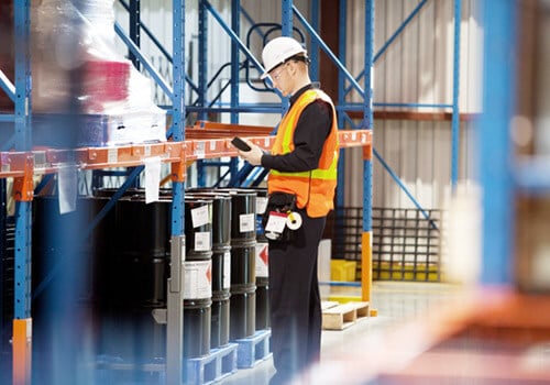 Damotech Engineer Inspecting a warehouse