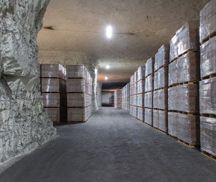 Marengo underground warehouse entrance in Indiana, showing the limestone quarry cut into a hillside with storage infrastructure.