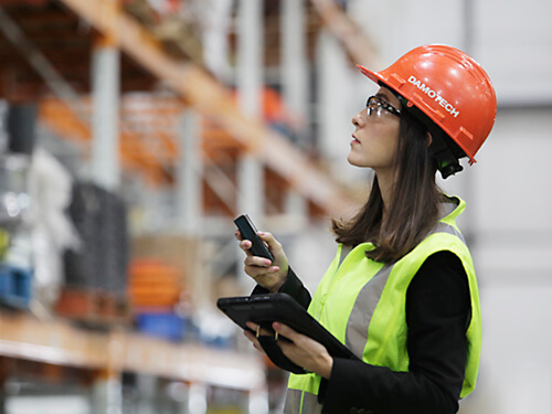 Damotech PSR engineer inspecting pallet racks