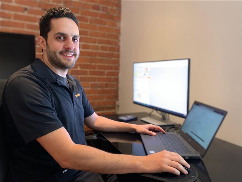 Sammy Bongiorno, Damotech Engineer, working in his office